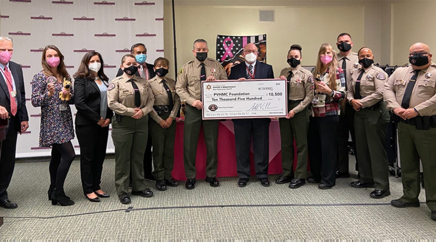 Sheriff presents check to Pomona Valley Hospital