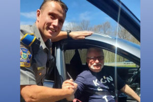 By chance, Polish cop helps Lech Walesa with flat tire in US
