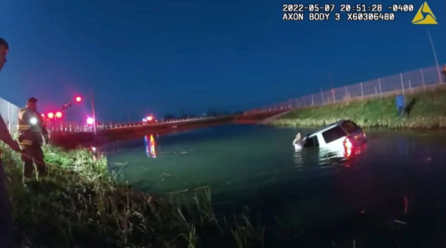 NY first responders rescue driver from car that crashed into reservoir.